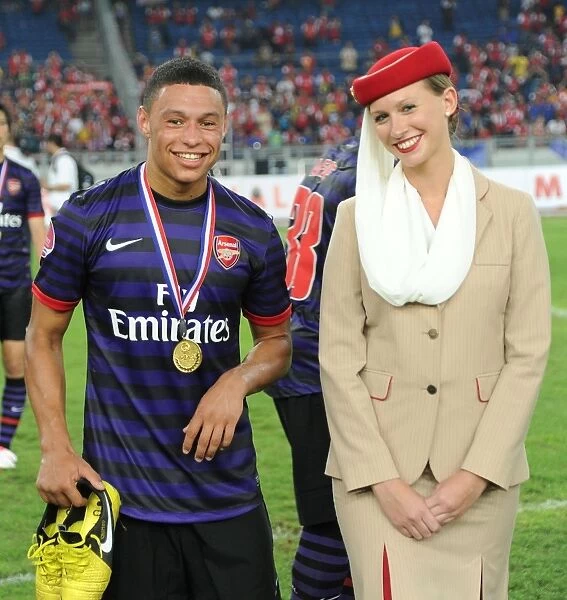 Alex Oxlade-Chamberlain Celebrates Arsenal's Victory with Emirates Crew in Malaysia, 2012