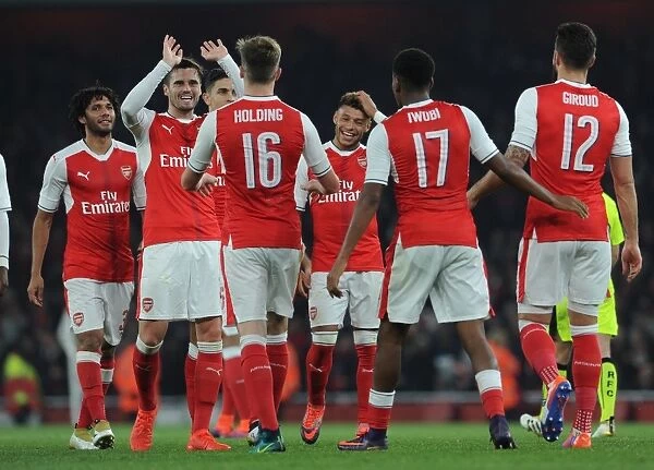 Alex Oxlade-Chamberlain celebrates scoring his 1st goal for Arsenal as Carl Jenkinson