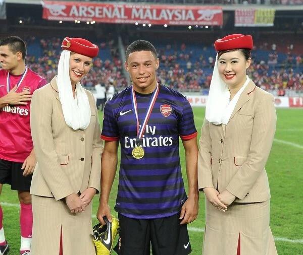 Alex Oxlade-Chamberlain with Emirates Crew after Arsenal's Win against Malaysia XI (2012)