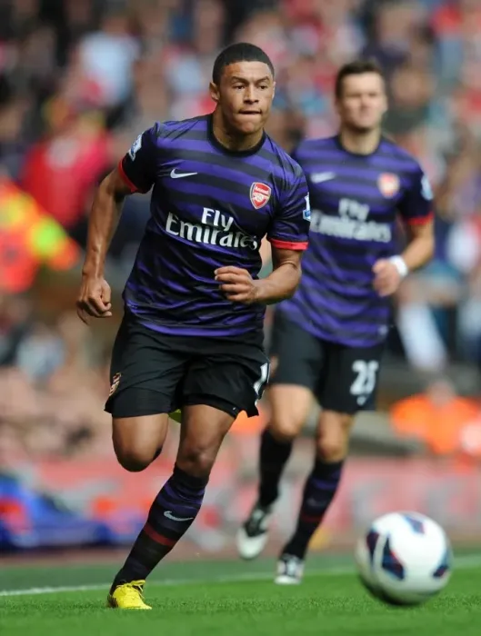 Framed Print : Alex Oxlade-Chamberlain Faces Liverpool: Premier League Showdown 2012-13 Framed Print : Alex Oxlade-Chamberlain Faces Liverpool: Premier League Showdown 2012-13