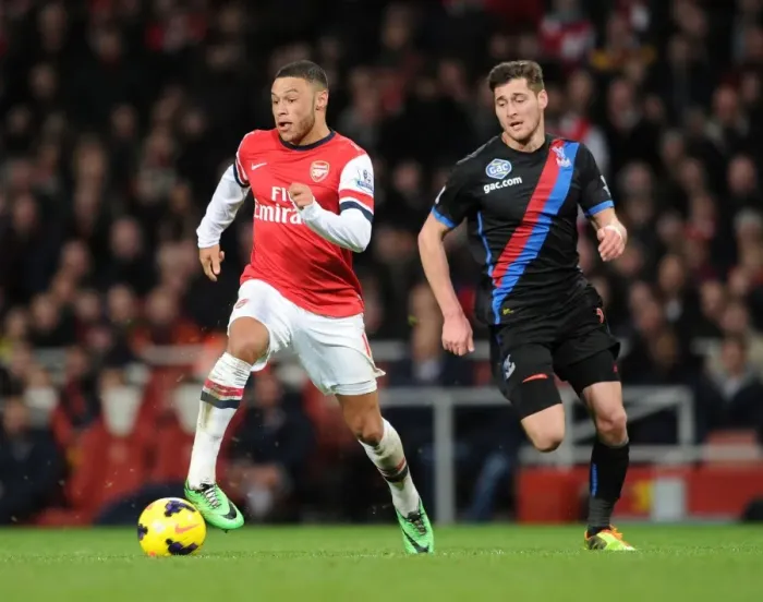 Framed Print : Alex Oxlade-Chamberlain Outsmarts Joel Ward: Arsenal's Triumph Over Crystal Palace