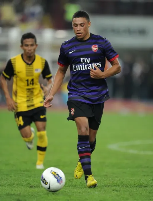 Framed Print : Alex Oxlade-Chamberlain Scores in Pre-Season Friendly: Arsenal Overcomes Malaysia 2-1 Framed Print : Alex Oxlade-Chamberlain Scores in Pre-Season Friendly: Arsenal Overcomes Malaysia 2-1