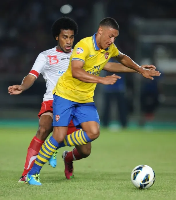Framed Print : Alex Oxlade-Chamberlain vs. Ian Kabes: Arsenal vs. Indonesia All-Stars, 2013 Framed Print : Alex Oxlade-Chamberlain vs. Ian Kabes: Arsenal vs. Indonesia All-Stars, 2013
