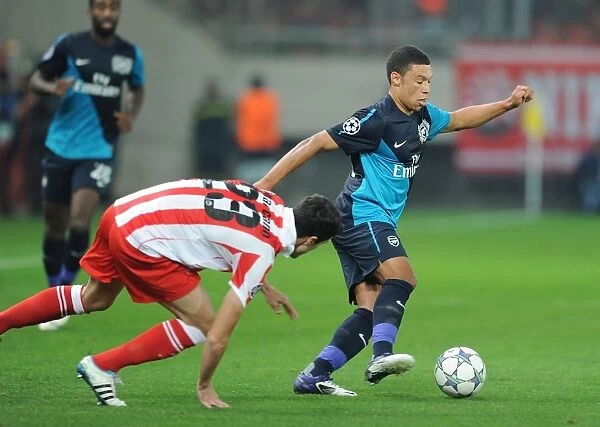 Alex Oxlade-Chamberlain vs Ivn Marcano: Battle in the UEFA Champions League between Olympiacos and Arsenal