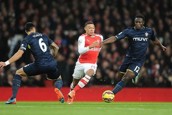 Alex Oxlade-Chamberlain's Slick Moves: Outsmarting Fonte and Wanyama in Arsenal's Victory over Southampton (2014-15)