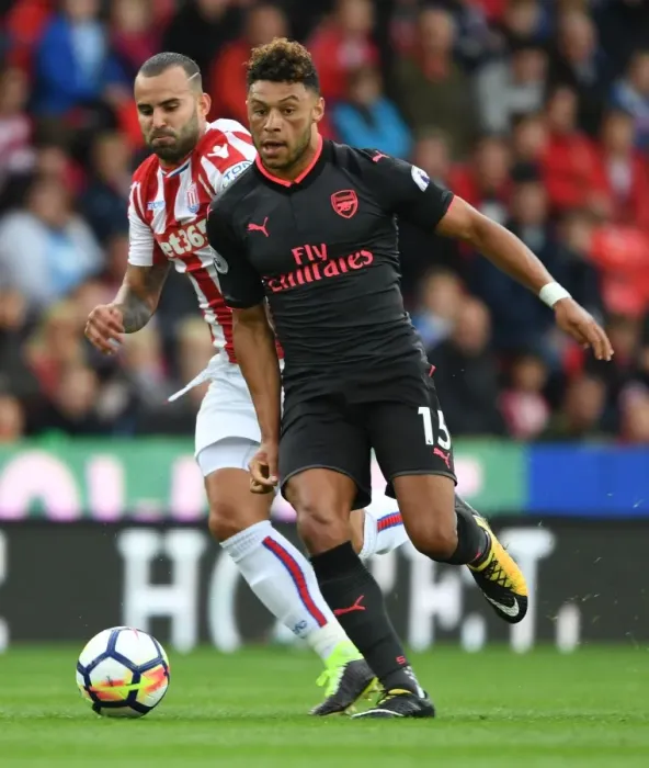 Framed Print : Alex Oxlade-Chamberlain's Slick Moves: Outsmarting Jese in Arsenal's Premier League Victory, 2017-18 Framed Print : Alex Oxlade-Chamberlain's Slick Moves: Outsmarting Jese in Arsenal's Premier League Victory, 2017-18