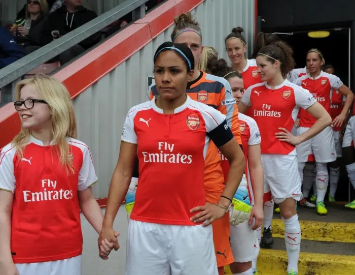 Framed Print : Alex Scott (Arsenal Ladies) with the mascot. Arsenal Ladies 2: 2 Notts County Ladies