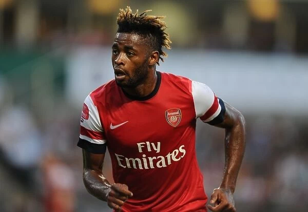 Alex Song in Action: Arsenal's Pre-Season Clash with Kitchee FC in Hong Kong, 2012