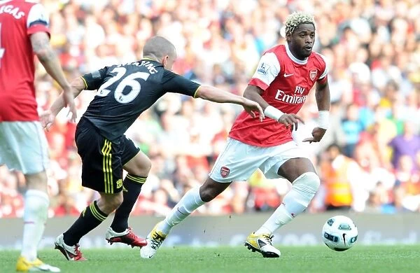 Alex Song (Arsenal) Jay Spearing (Liverpool). Arsenal 1: 1 Liverpool. Barclays Premier League