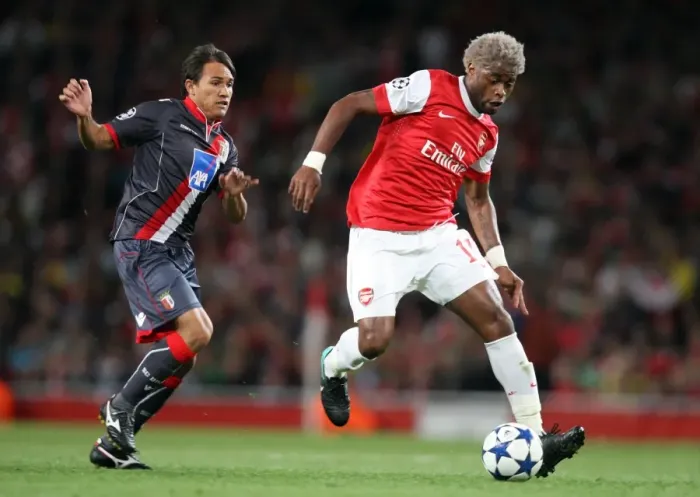 Framed Print : Alex Song (Arsenal) Mossoro (Braga). Arsenal 6: 0 SC Braga. UEFA Champions League