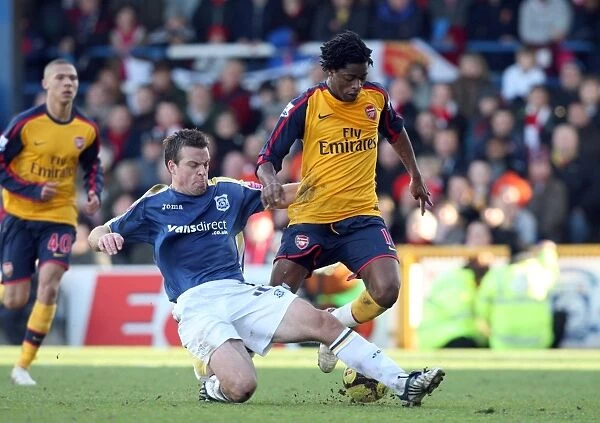 Alex Song (Arsenal) Paul Parry (Cardiff)