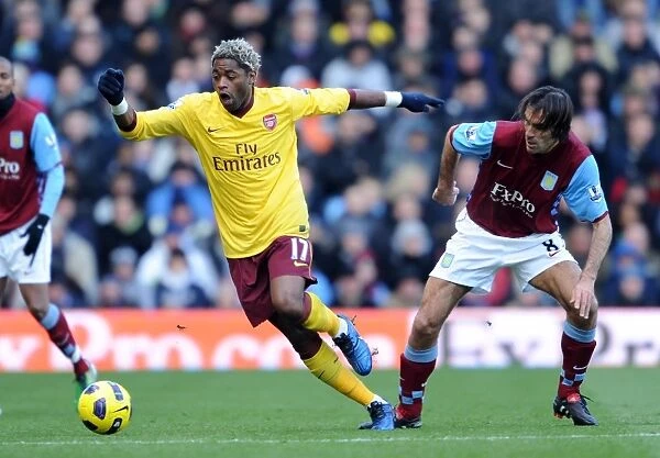 Alex Song (Arsenal) Robert Pires (Villa). Aston Villa 2: 4 Arsenal. Barclays Premier League