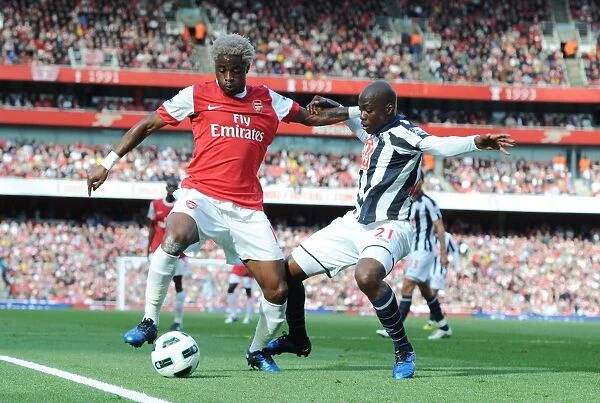 Alex Song (Arsenal) Youssouf Mulumbu (WBA). Arsenal 2: 3 West Bromwich Albion