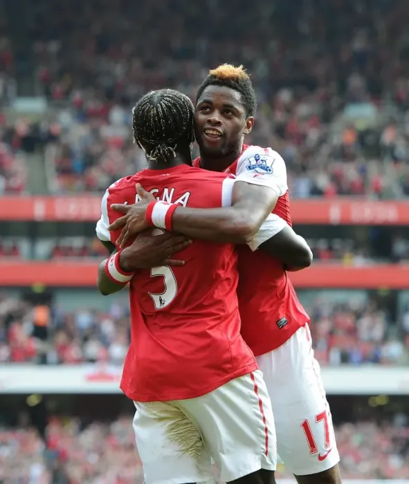 Framed Print : Alex Song and Bacary Sagna: Arsenal's Unstoppable Duo Celebrate 3-0 Over Bolton Wanderers