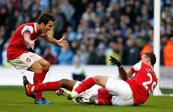 Alex Song celebrates scoring the 2nd Arsenal goal Marouane Chamakh and Cesc Fabregas
