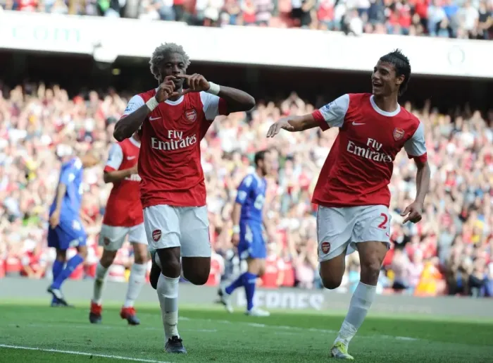 Framed Print : Alex Song celebrates scoring the 3rd Arsenal goal with Marouane Chamakh