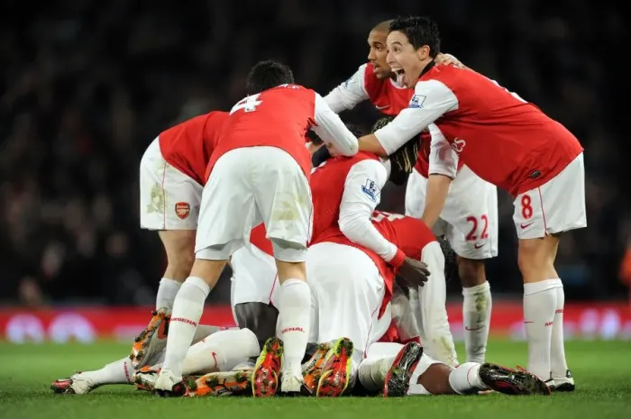 Framed Print : Alex Song celebrates scoring Arsenals 1st goal with his team mates including Samir Nasri