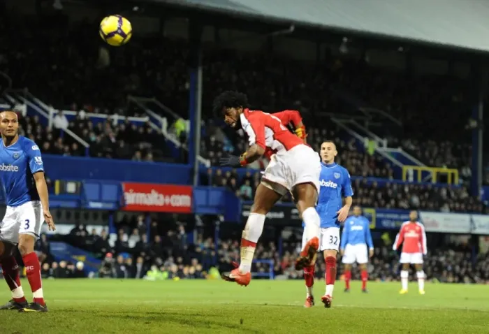Framed Print : Alex Song heads past Portsmouth goalkeeper Asmir Begovic to score the 4th Arsenal goal