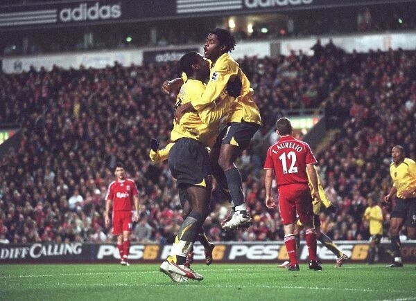 Alex Song and Johan Djourou: Celebrating Arsenal's Historic 3-6 Win Over Liverpool in the Carling Cup