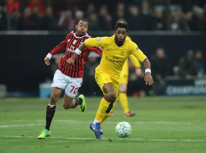 Framed Print : Alex Song Outmaneuvers Robinho: A Moment from the AC Milan vs. Arsenal UEFA Champions League Clash, 2012 Framed Print : Alex Song Outmaneuvers Robinho: A Moment from the AC Milan vs. Arsenal UEFA Champions League Clash, 2012