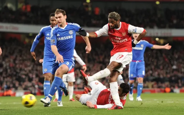 Framed Print : Alex Song scores Arsenals 1st goal under pressure from Branislav Ivanovic (Chelsea)