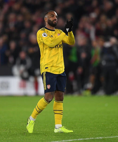 Alexandre Lacazette Celebrates with Arsenal Fans after Sheffield United Victory (2019-20)