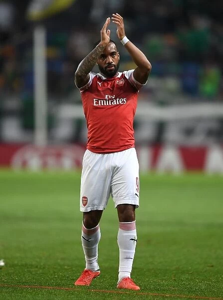 Alexandre Lacazette Celebrates with Arsenal Fans after UEFA Europa League Win over Sporting CP