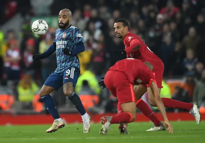 Framed Print : Alexandre Lacazette Faces Off Against Joel Matip in Intense Carabao Cup Clash: Liverpool vs Arsenal, 2021-22 Framed Print : Alexandre Lacazette Faces Off Against Joel Matip in Intense Carabao Cup Clash: Liverpool vs Arsenal, 2021-22