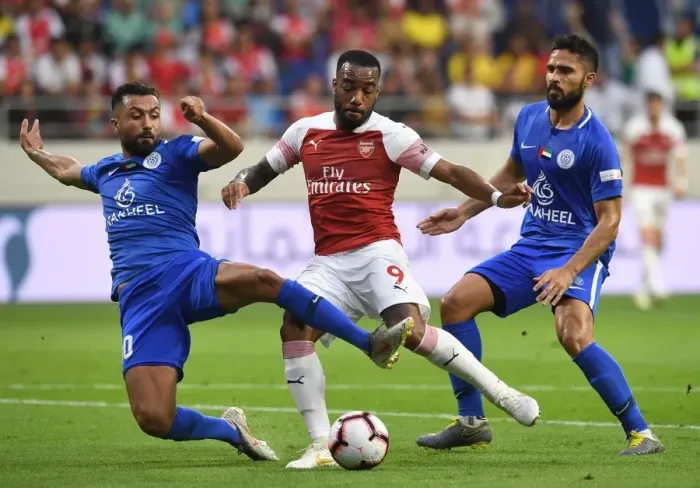 Framed Print : Alexandre Lacazette Faces Off Against Masoud Sulaiman in Al-Nasr Dubai SC vs Arsenal Friendly Framed Print : Alexandre Lacazette Faces Off Against Masoud Sulaiman in Al-Nasr Dubai SC vs Arsenal Friendly