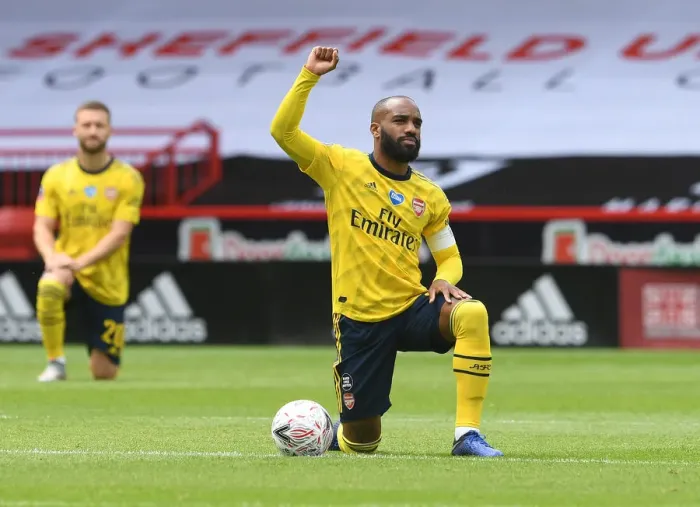 Framed Print : Alexandre Lacazette Kneels Before FA Cup Quarterfinal: Sheffield United vs. Arsenal