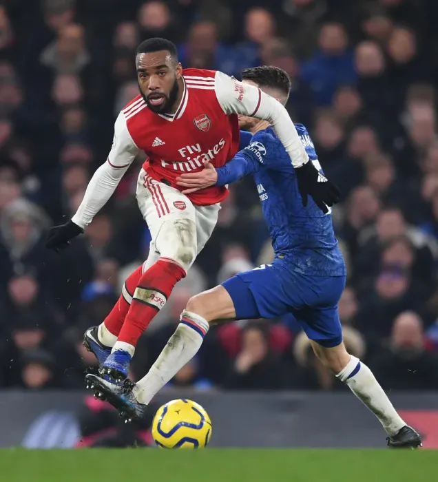 Framed Print : Alexandre Lacazette Outwits Jorginho: A Premier League Showdown at Stamford Bridge, 2019-20