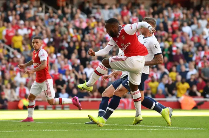 Framed Print : Alexandre Lacazette Scores the Opener: Arsenal Triumphs over Tottenham in Intense Premier League Clash (2019-20)