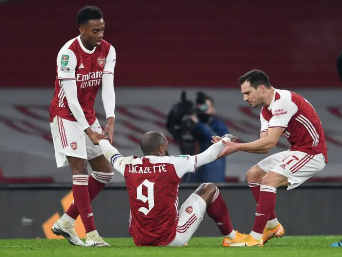 Framed Print : Alexandre Lacazette Scores the Winner: Arsenal Defeats Manchester City in Carabao Cup Quarterfinal