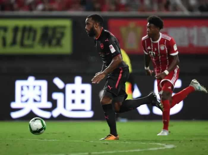 Framed Print : Alexandre Lacazette vs. David Alaba: Battle at the Shanghai Pre-Season Friendly between Bayern Munich and Arsenal Framed Print : Alexandre Lacazette vs. David Alaba: Battle at the Shanghai Pre-Season Friendly between Bayern Munich and Arsenal