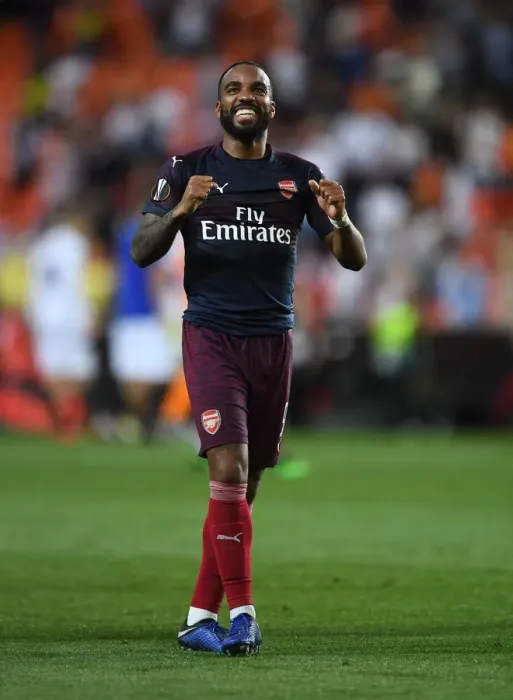 Framed Print : Alexandre Lacazette's Celebration: Arsenal Advance to Europa League Final after Dramatic Second Leg Win over Valencia