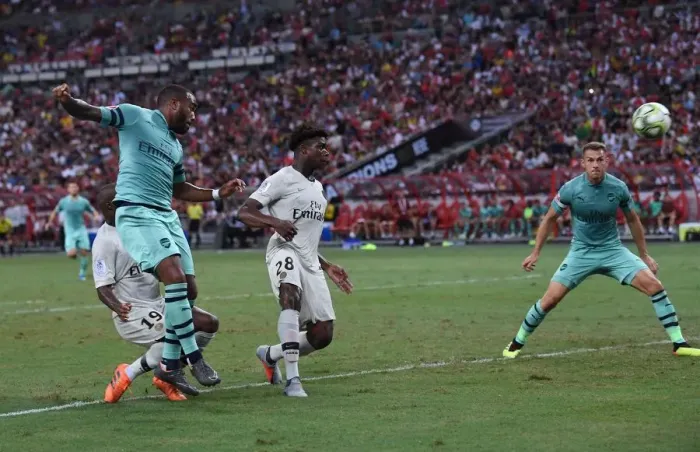 Framed Print : Alexandre Lacazette's Stunning Goal: Arsenal Upsets Paris Saint-Germain in 2018 International Champions Cup, Singapore