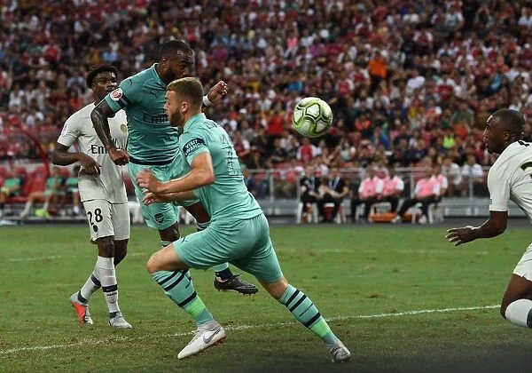 Alexandre Lacazette's Stunning Goal: Arsenal Upsets Paris Saint-Germain in 2018 Pre-Season Clash, Singapore