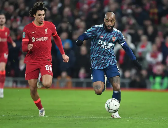 Framed Print : Alexis Lacazette Breaks Past Trent Alexander-Arnold in Carabao Cup Semi-Final Clash: Liverpool vs. Arsenal
