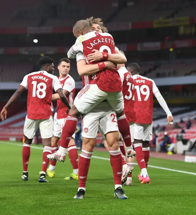 Framed Print : Alexis Lacazette and David Luiz Celebrate Arsenal's Win Against Tottenham Hotspur in Empty Emirates Stadium (2020-21) Framed Print : Alexis Lacazette and David Luiz Celebrate Arsenal's Win Against Tottenham Hotspur in Empty Emirates Stadium (2020-21)