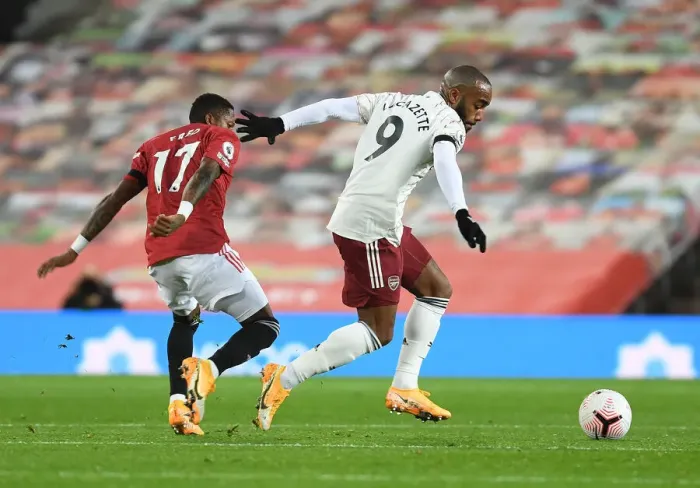 Framed Print : Alexis Lacazette Outsmarts Fred: Tactical Clash at Old Trafford - Manchester United vs. Arsenal, Premier League 2020-21 Framed Print : Alexis Lacazette Outsmarts Fred: Tactical Clash at Old Trafford - Manchester United vs. Arsenal, Premier League 2020-21