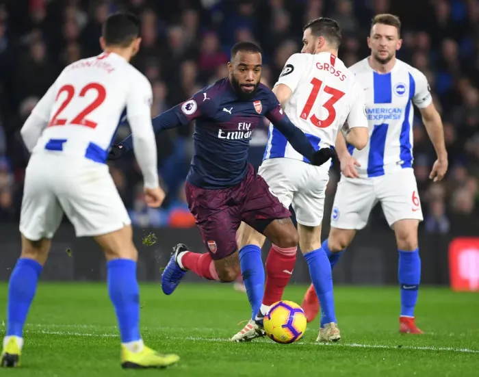 Framed Print : Alexis Lacazette Outsmarts Pascal Gross: Arsenal's Triumph Over Brighton