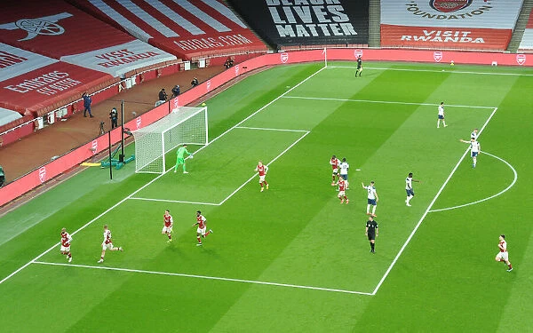Alexis Lacazette Scores Thrilling Penalty: Arsenal's Victory Against Tottenham in Empty Emirates Stadium, 2021 Premier League