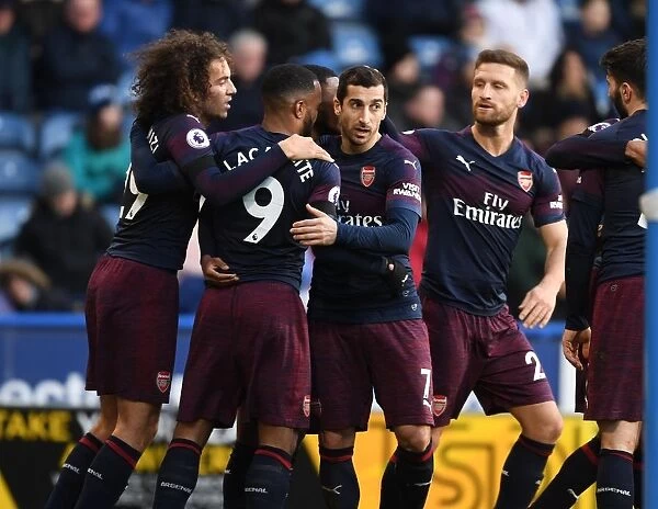 Alexis Lacazette's Brace: Arsenal Cruise Past Huddersfield in Premier League