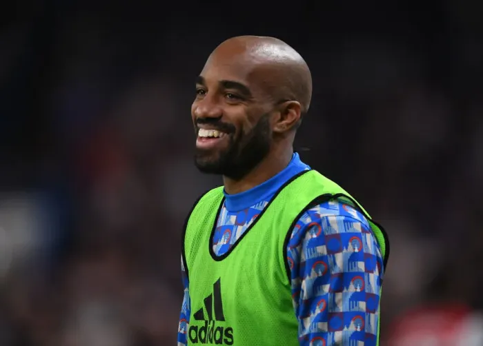 Framed Print : Alexis Lacazette's Playful Moment with Arsenal Fans Amidst Chelsea Rivalry (Premier League 2021-22)
