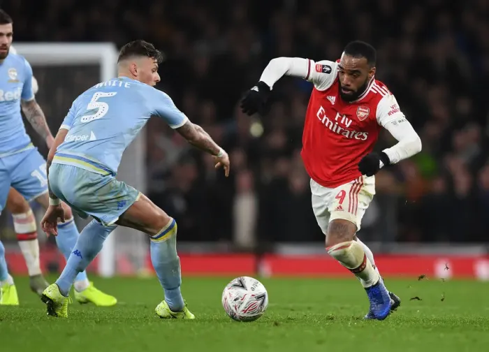 Framed Print : Alexis Lacazette's Sneaky Move: Outsmarting Ben White in Arsenal's FA Cup Triumph over Leeds