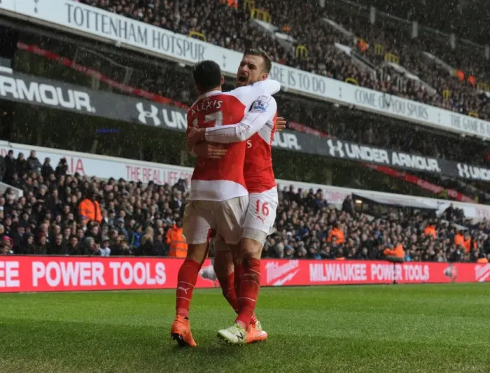 Framed Print : Alexis Sanchez and Aaron Ramsey: Arsenal's Unstoppable Duo Celebrate Goals Against Tottenham Hotspur (2015-16)