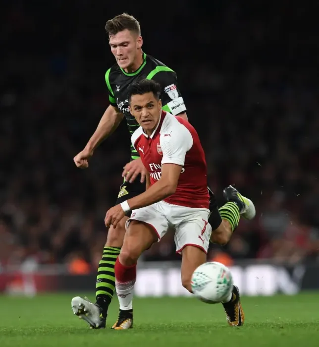 Framed Print : Alexis Sanchez (Arsenal) Joe Wright (Doncaster). Arsenal 1: 0 Doncaster. The Carabao Cup Framed Print : Alexis Sanchez (Arsenal) Joe Wright (Doncaster). Arsenal 1: 0 Doncaster. The Carabao Cup
