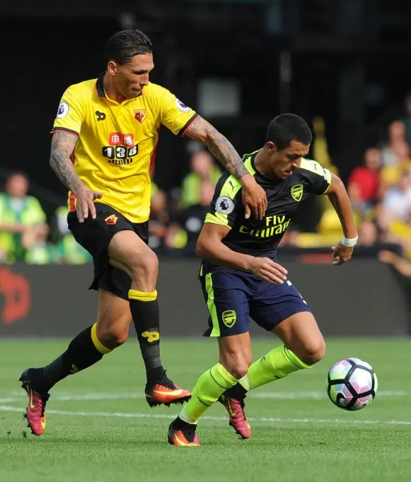 Framed Print : Alexis Sanchez (Arsenal) Jose Holebas (Watford). Watford 1: 3 Arsenal. Premier League Framed Print : Alexis Sanchez (Arsenal) Jose Holebas (Watford). Watford 1: 3 Arsenal. Premier League