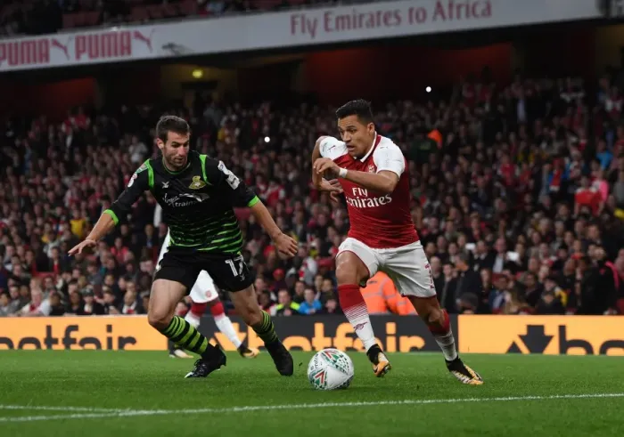 Framed Print : Alexis Sanchez (Arsenal) Matty Blair (Doncaster). Arsenal 1: 0 Doncaster. The Carabao Cup Framed Print : Alexis Sanchez (Arsenal) Matty Blair (Doncaster). Arsenal 1: 0 Doncaster. The Carabao Cup