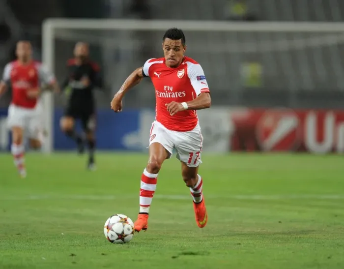 Framed Print : Alexis Sanchez: Arsenal's Star Forward in Action against Besiktas, UEFA Champions League Qualifier (2014)